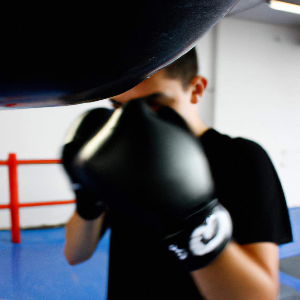 Person performing boxing training exercises